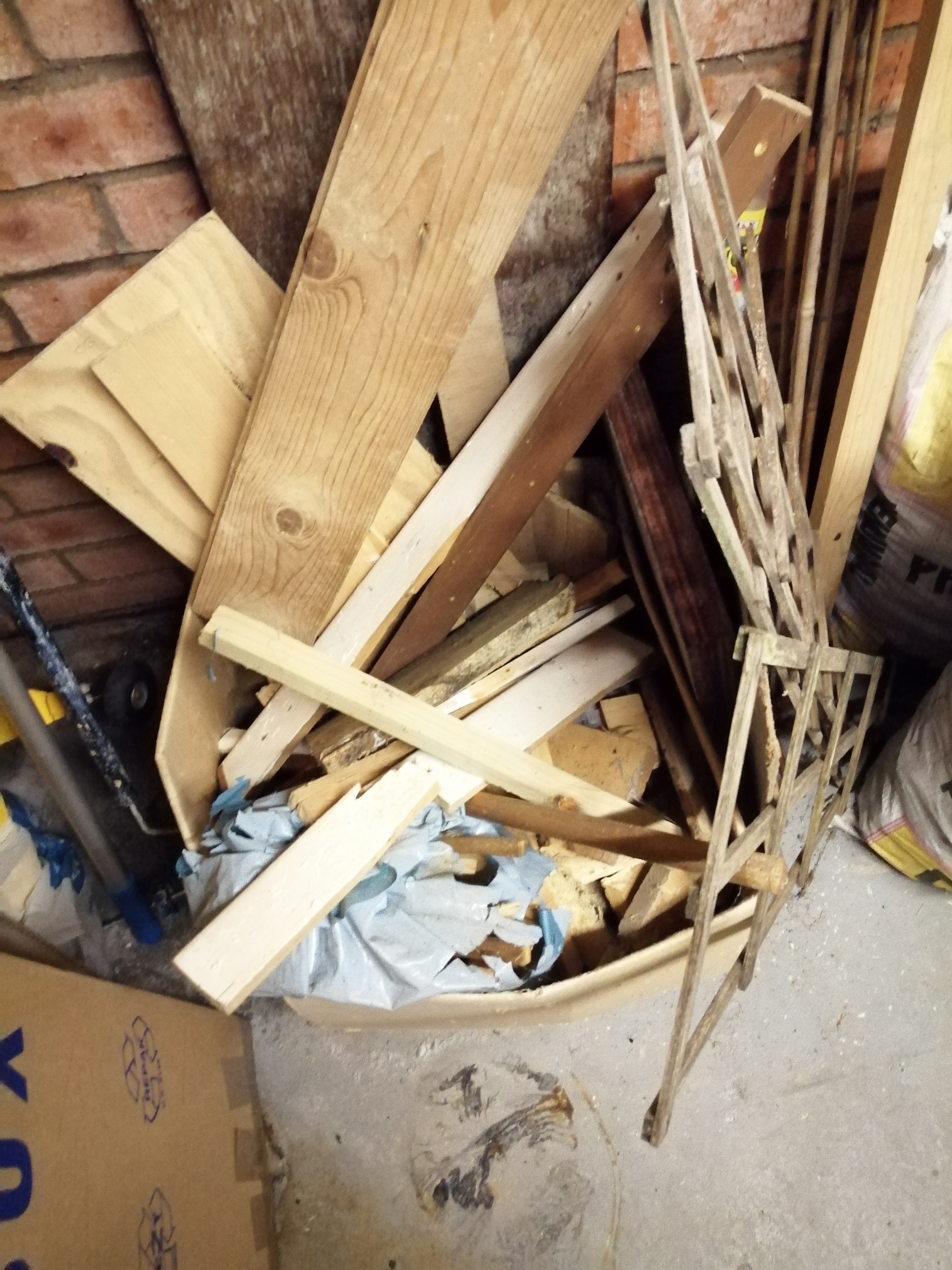 Scrap wood pile in garage